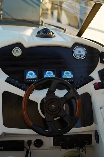  Yacht Photos Pics Steering wheel and dashboard of 2000 Sunseeker Superhawk 48 Mk II yacht.