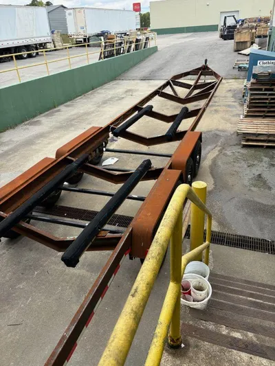  Yacht Photos Pics Rusty boat trailer frame in industrial area, suitable for Sunseeker Superhawk 48 Mk II, 2000 model.