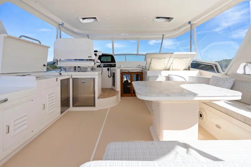  Yacht Photos Pics Luxurious interior of 2023 Fleming 65 yacht with modern amenities and elegant design.