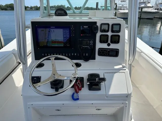  Yacht Photos Pics Helm console of a 2005 Regulator 32 Forward Seating boat.