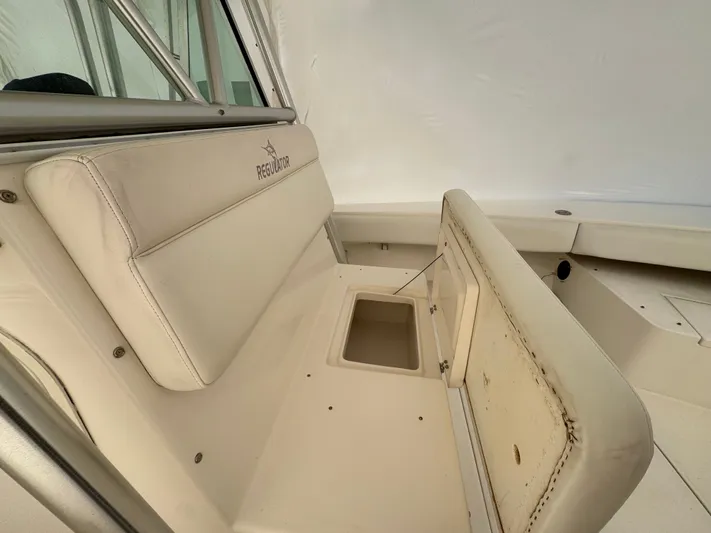  Yacht Photos Pics Regulator 32 boat seating with storage, year 2005.
