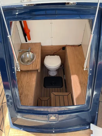  Yacht Photos Pics Interior of 2022 RIB 30 boat with sink and toilet.