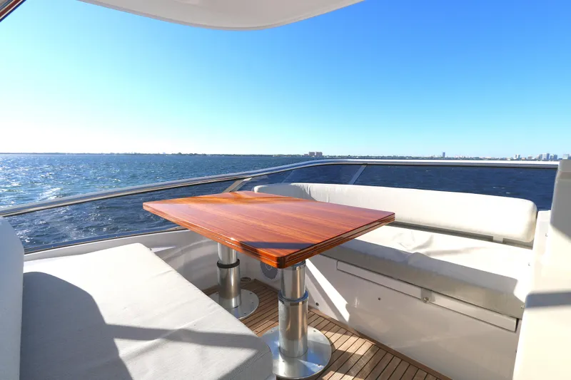 This Is It Yacht Photos Pics Luxurious 2019 Azimut 72 Flybridge yacht with elegant outdoor seating and ocean view.