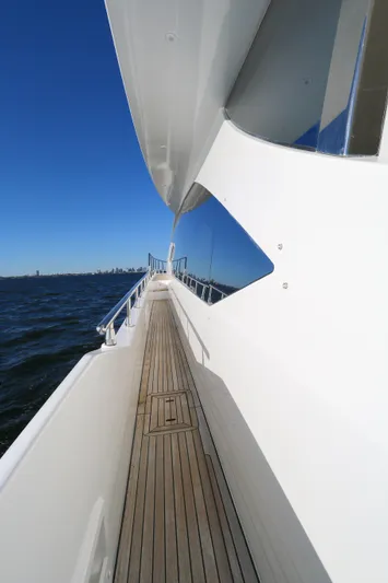 This Is It Yacht Photos Pics Side deck view of 2019 Azimut 72 Flybridge yacht on open water.