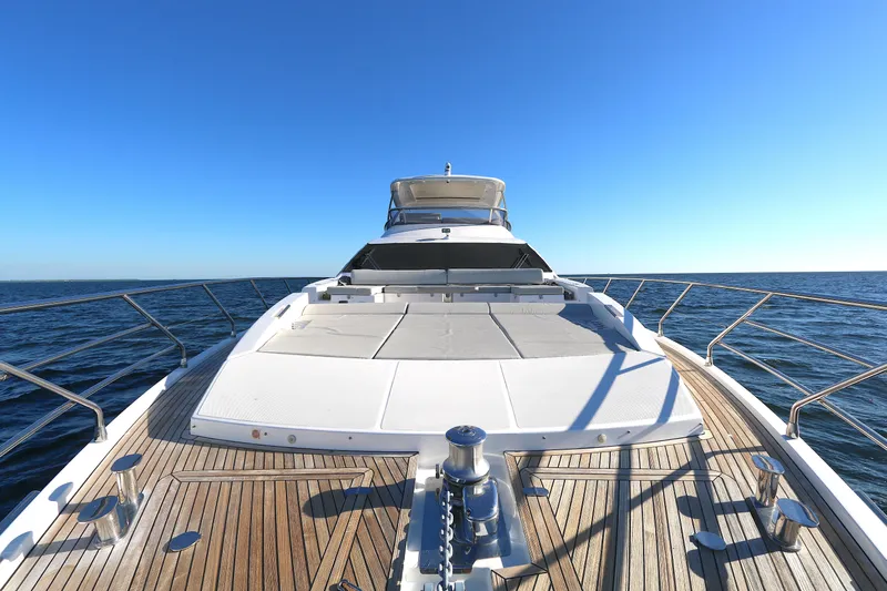 This Is It Yacht Photos Pics 2019 Azimut 72 Flybridge yacht on open sea, showcasing spacious deck and sleek design.