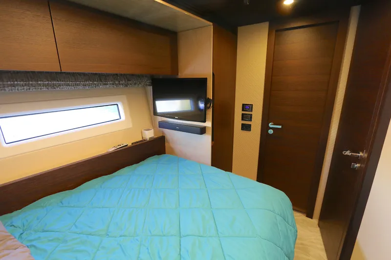 This Is It Yacht Photos Pics Luxurious bedroom interior of 2019 Azimut 72 Flybridge yacht with modern design.