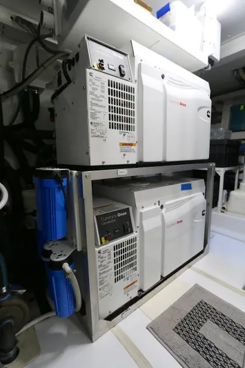 This Is It Yacht Photos Pics Engine room of 2019 Azimut 72 Flybridge yacht with Cummins Onan generators.