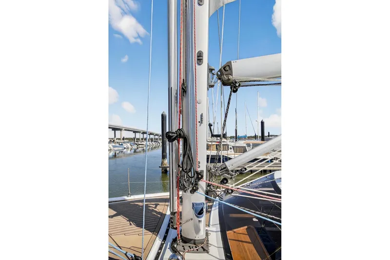 Off The Grid Yacht Photos Pics 2024 Southerly 420 sailboat mast and rigging at marina, clear blue sky.