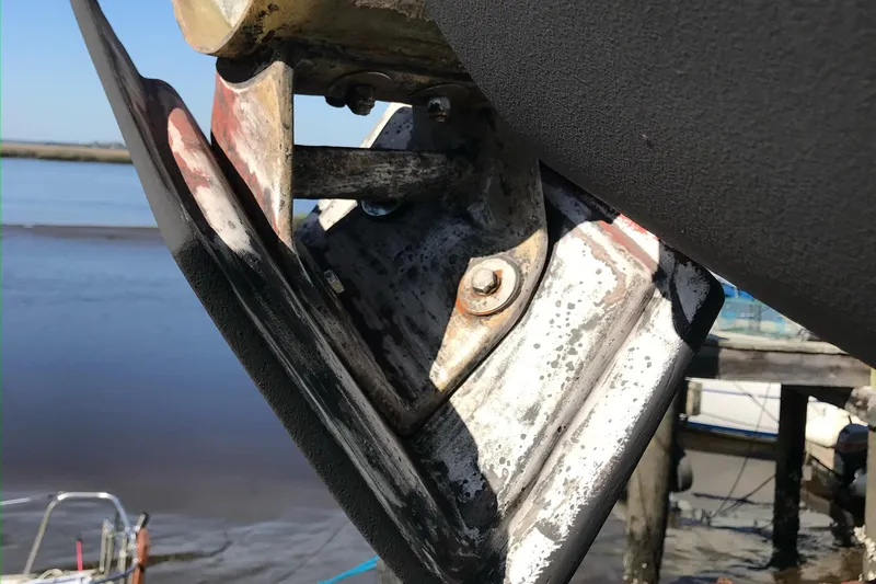 Wanderer Yacht Photos Pics Close-up of a 1982 Hinckley Sou'wester 59 boat component by the water.