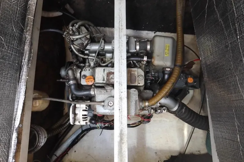 Thalassa Yacht Photos Pics Engine compartment of a 2005 Fountaine Pajot Bahia 46 catamaran, showcasing mechanical components.