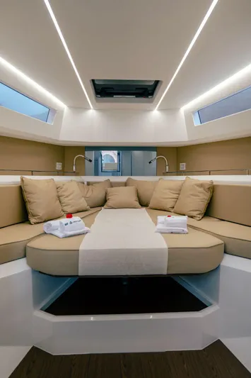 Evo R4 Wa Yacht Photos Pics Luxurious interior of 2024 Evo Yachts R4 WA with plush seating and modern lighting.