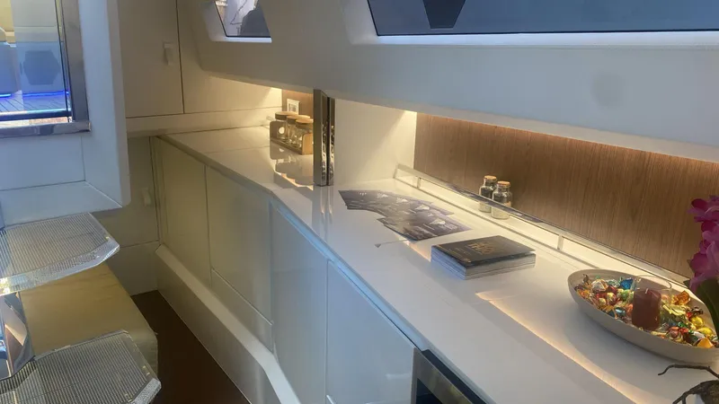 Evo R4 Wa Yacht Photos Pics Luxurious interior of 2024 Evo Yachts R4 WA with sleek countertops and modern decor.