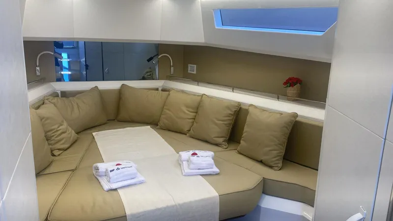 Evo R4 Wa Yacht Photos Pics Luxurious interior of 2024 Evo Yachts R4 WA with cozy seating and elegant decor.