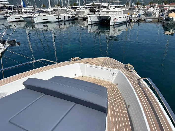 Barbarossa Yacht Photos Pics 2024 Fiart 43 Seawalker yacht docked in marina, featuring sleek deck design.