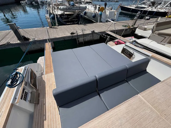 Barbarossa Yacht Photos Pics 2024 Fiart 43 Seawalker yacht with spacious sunbed at marina dock.