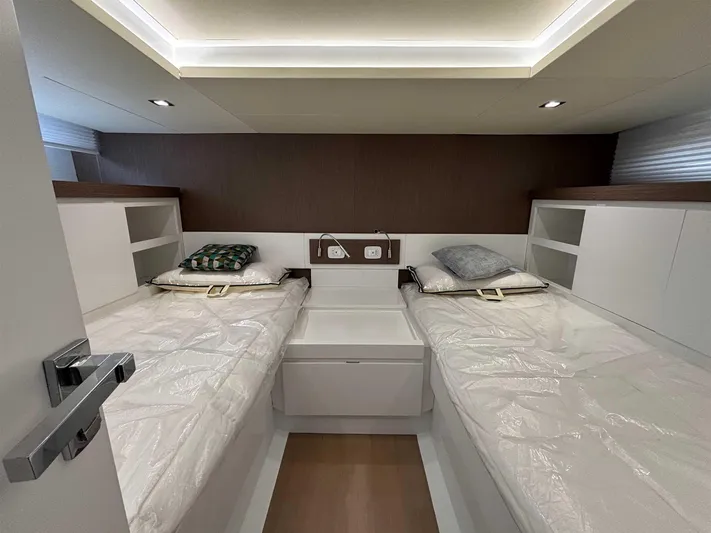 Barbarossa Yacht Photos Pics 2024 Fiart 43 Seawalker cabin interior with twin beds and modern design.