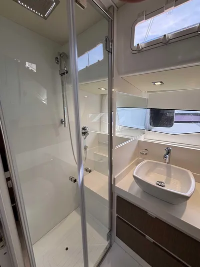 Barbarossa Yacht Photos Pics 2024 Fiart 43 Seawalker yacht bathroom with modern shower and sink design.