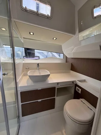 Barbarossa Yacht Photos Pics 2024 Fiart 43 Seawalker yacht bathroom with modern fixtures and sleek design.
