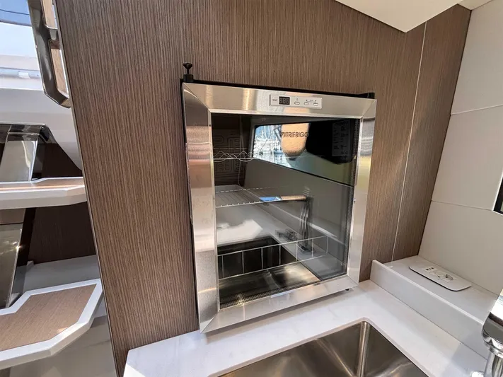 Barbarossa Yacht Photos Pics 2024 Fiart 43 Seawalker yacht kitchen with modern stainless steel appliances.