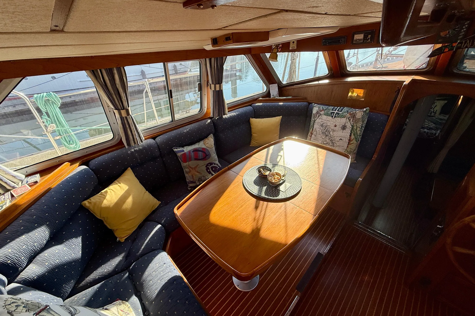Comfortable dinette in pilothouse with great visibility.