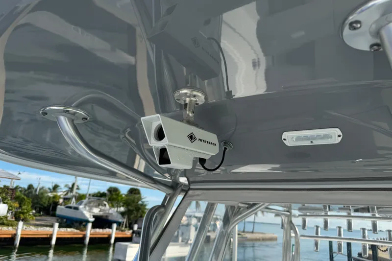  Yacht Photos Pics Security camera installed on Freeman 34VH boat, 2022 model, with sleek metallic framework.