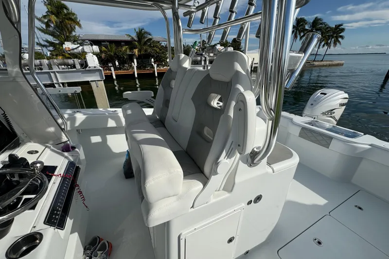  Yacht Photos Pics Interior of a 2022 Freeman 34VH boat with luxurious seating and modern controls.