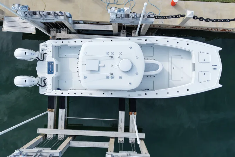  Yacht Photos Pics Aerial view of a 2022 Freeman 34VH boat docked with dual engines.