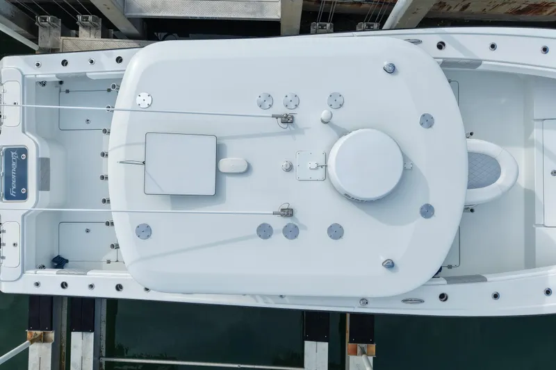  Yacht Photos Pics Overhead view of a 2022 Freeman 34VH boat docked at a marina.