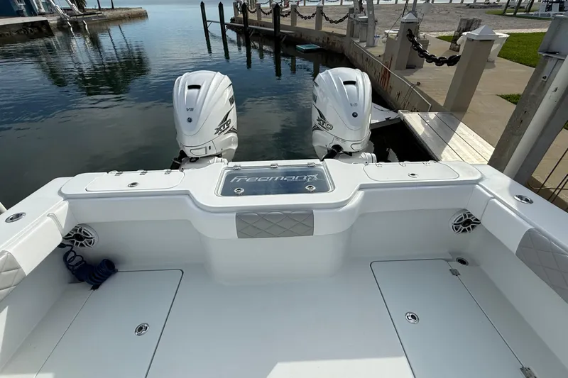  Yacht Photos Pics 2022 Freeman 34VH boat with twin engines docked at marina.