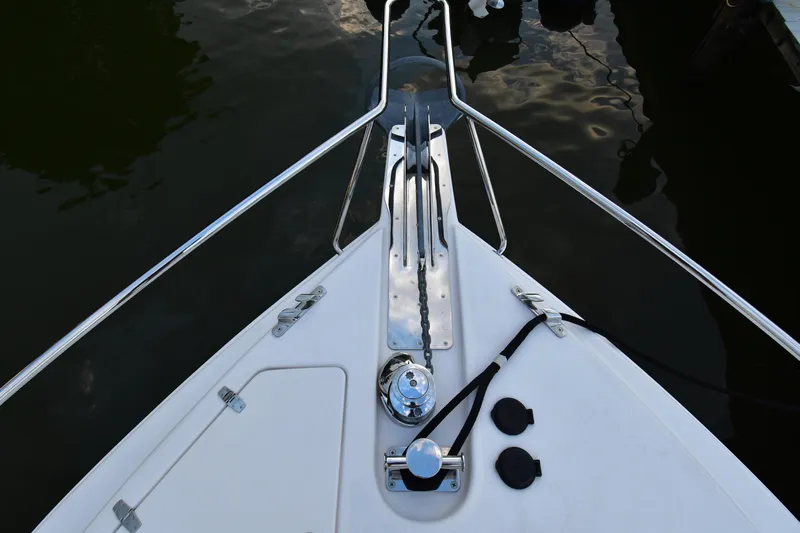 Promesa Yacht Photos Pics Bow of 2021 Hylas M44 yacht with anchor system and railing.