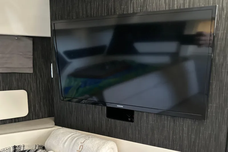 Jet Privé Yacht Photos Pics Samsung TV mounted inside 2021 Searay 370ob boat interior.