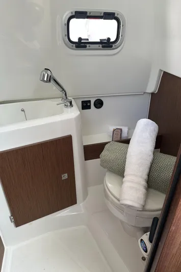 Jebang Yacht Photos Pics 2023 Jeanneau Leader 9.0 CC boat bathroom with sink and toilet.