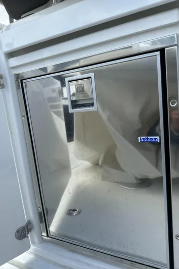 Jebang Yacht Photos Pics 2023 Jeanneau Leader 9.0 CC boat interior with stainless steel storage compartment.