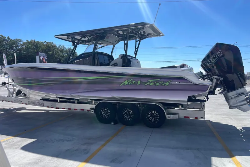  Yacht Photos Pics 2026 Nor-Tech 340 Sport Center Console boat on trailer, featuring sleek design and powerful engines.