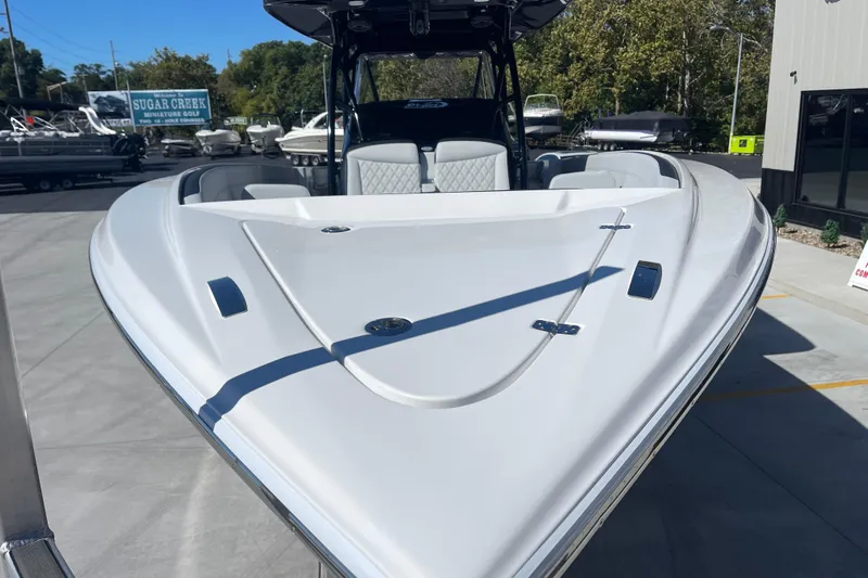  Yacht Photos Pics 2026 Nor-Tech 340 Sport Center Console boat, sleek design, parked outdoors.