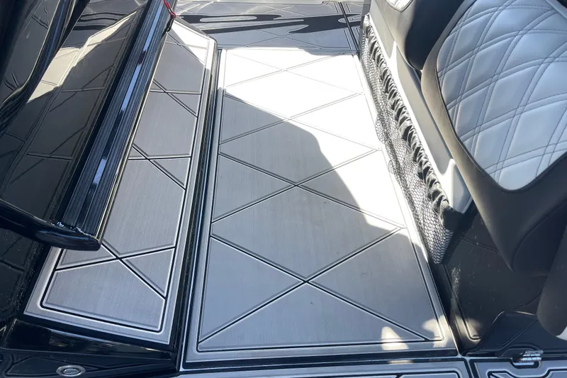  Yacht Photos Pics 2026 Nor-Tech 340 Sport Center Console interior with sleek, modern flooring and cushioned seating.