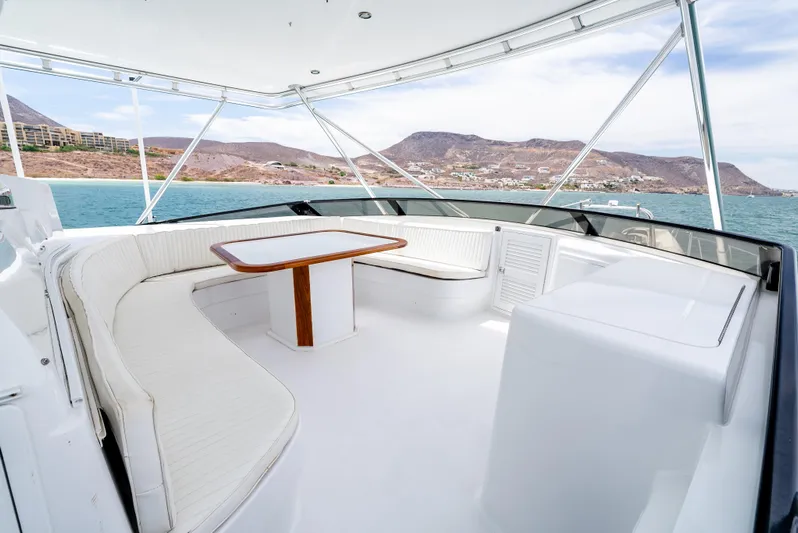 Tiger Spirit Yacht Photos Pics Luxurious 1995 Donzi 72 Convertible yacht interior with white seating and ocean view.