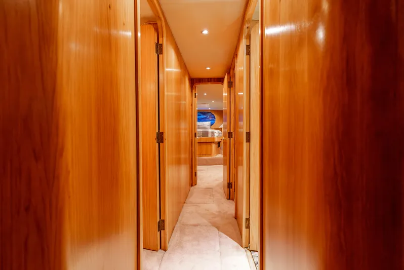 Tiger Spirit Yacht Photos Pics Luxurious wooden hallway inside 1995 Donzi 72 Convertible yacht.