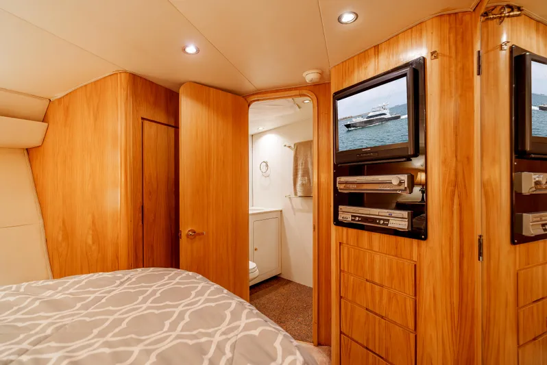 Tiger Spirit Yacht Photos Pics Interior of 1995 Donzi 72 Convertible yacht with wood paneling and modern amenities.