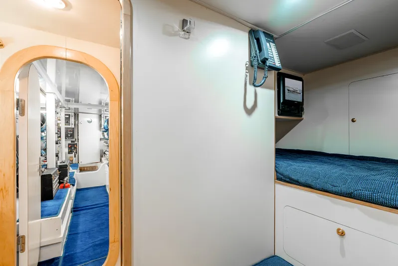 Tiger Spirit Yacht Photos Pics Interior of 1995 Donzi 72 Convertible yacht with bunk bed and phone.