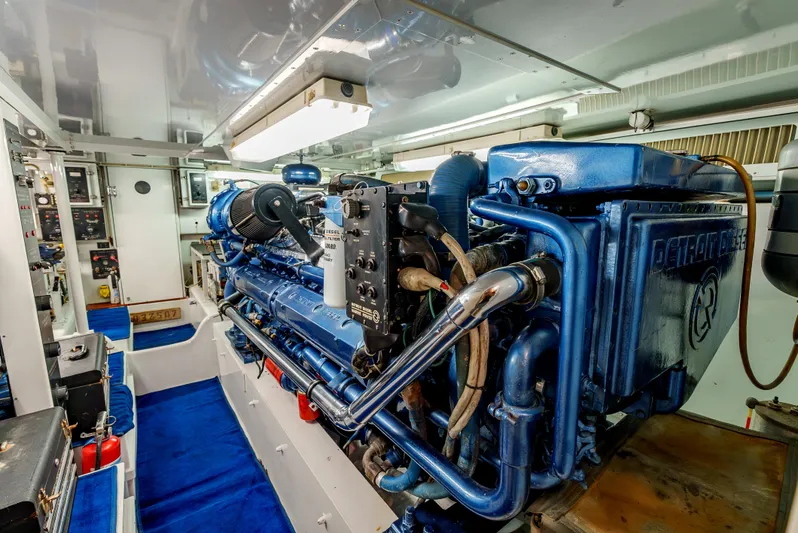 Tiger Spirit Yacht Photos Pics Engine room of a 1995 Donzi 72 Convertible yacht, featuring a powerful marine engine.