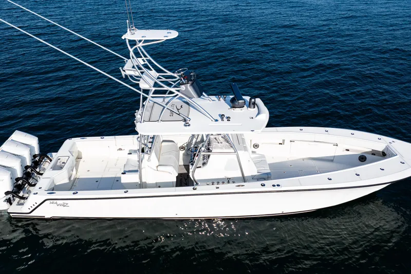  Yacht Photos Pics 2020 SeaVee 390Z boat on open water, featuring multiple outboard engines.