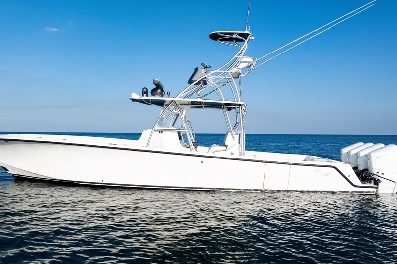  Yacht Photos Pics 2020 SeaVee 390Z boat on calm ocean under clear blue sky.