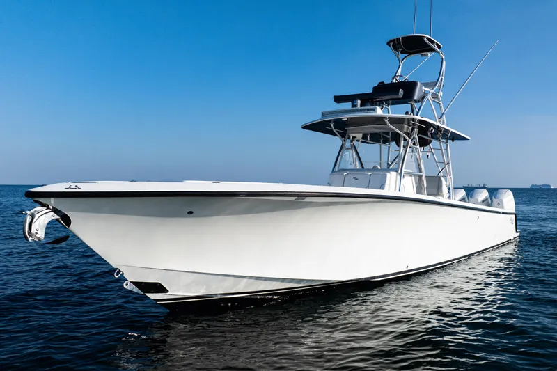  Yacht Photos Pics 2020 SeaVee 390Z boat on calm ocean under clear blue sky.