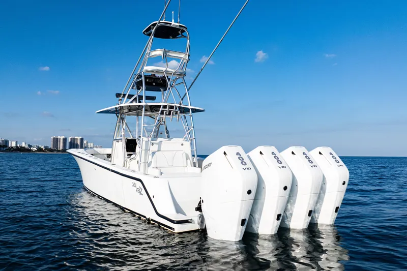  Yacht Photos Pics 2020 SeaVee 390Z boat with four outboard engines on open water.
