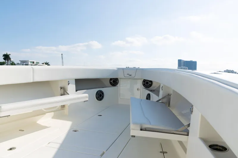 Yacht Photos Pics 2020 SeaVee 390Z boat interior with seating and speakers under a clear sky.