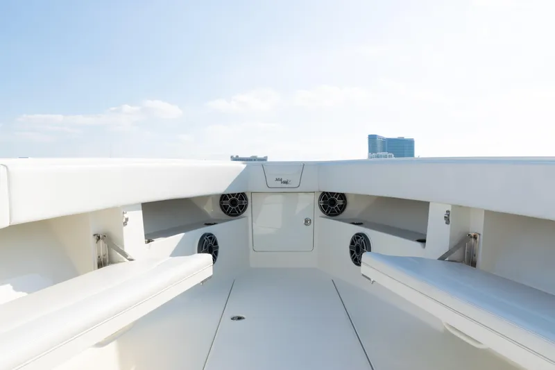  Yacht Photos Pics 2020 SeaVee 390Z boat interior with seating and speakers, under a clear sky.