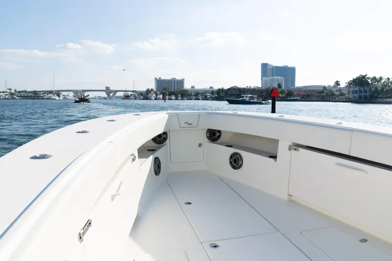  Yacht Photos Pics 2020 SeaVee 390Z boat interior with waterfront cityscape in the background.