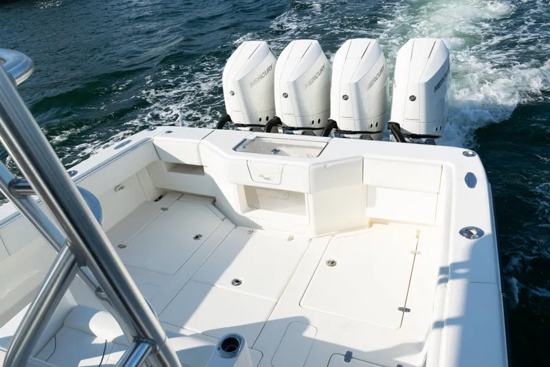  Yacht Photos Pics 2020 SeaVee 390Z boat with four Mercury engines cruising on water.