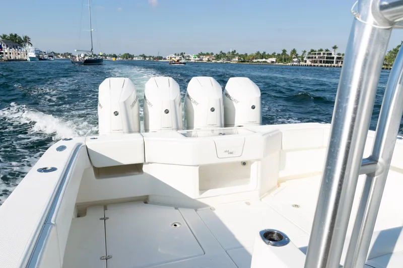 Yacht Photos Pics 2020 SeaVee 390Z boat with four Mercury engines cruising on a sunny day.